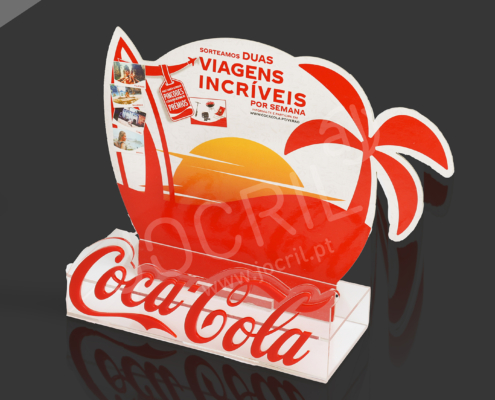 Display de balcão em acrílico transparente recortado + crowner em cartão impresso. Logo Coca-Cola recortado a laser com impressão.